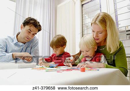 Little boys doing handicraft View Large Photo Image Stock Photo - Little boys doing handicraft. Fotosearch