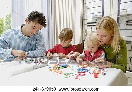 Little boys doing handicraft View Large Photo Image Stock Photo - Little boys doing handicraft. Fotosearch