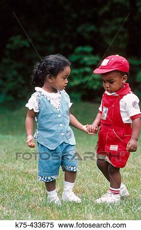 little friends holding hands View Large Photo Image Stock Photography - little friends holding hands. Fotosearch