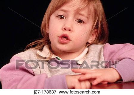 Stock Photo - Little girl asks question or states opinion. Fotosearch