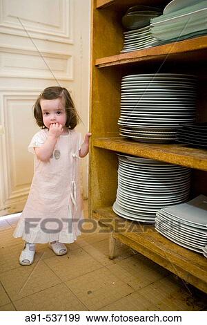 Little girl at Ch? teu de Rochecotte luxury hotel, Saint-Patrice. Indre-et-Loire, France View Large Photo Image Stock Photo - Little girl at Ch? teu de Rochecotte luxury hotel, Saint-Patrice. Indre-et-Loire, France. Fotosearch