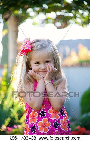 little girl being bashful View Large Photo Image Stock Photo - little girl being bashful. Fotosearch