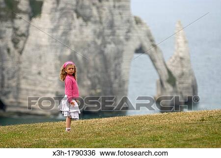 little girl dancing on the top of cliff, Etretat, Cote d? Albatre, Pays de Caux, Seine-Maritime department, Upper Normandy region, France, Europe View Large Photo Image Stock Photograph - little girl dancing on the top of cliff, Etretat, Cote d? Albatre, Pays de Caux, Seine-Maritime department, Upper Normandy region, France, Europe. Fotosearch