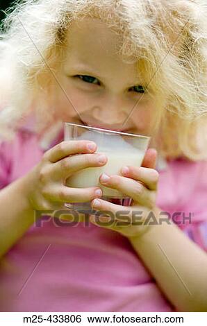 Little girl drinking glass of milk View Large Photo Image Stock Photograph - Little girl drinking glass of milk. Fotosearch