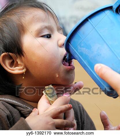 little girl drinking water during festival, the nepalis, life in kathmandu, kathmandu street life, Nepal View Large Photo Image Stock Image - little girl drinking water during festival, the nepalis, life in kathmandu, kathmandu street life, Nepal. Fotosearch