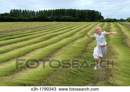 little girl in a cut flax field around Etretat, Cote d? Albatre, Pays de Caux, Seine-Maritime department, Upper Normandy region, France, Europe View Large Photo Image Stock Image - little girl in a cut flax field around Etretat, Cote d? Albatre, Pays de Caux, Seine-Maritime department, Upper Normandy region, France, Europe. Fotosearch