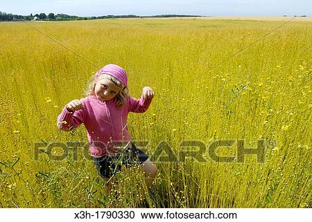 little girl in a flax field around Etretat, Cote d? Albatre, Pays de Caux, Seine-Maritime department, Upper Normandy region, France, Europe View Large Photo Image Stock Image - little girl in a flax field around Etretat, Cote d? Albatre, Pays de Caux, Seine-Maritime department, Upper Normandy region, France, Europe. Fotosearch
