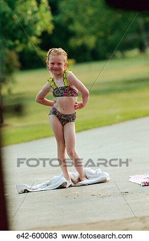 Little girl in bathing suit View Large Photo Image Stock Image - Little girl in bathing suit. Fotosearch