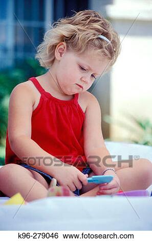 Stock Photograph - Little Girl in Red. Fotosearch