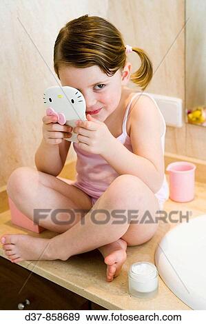 Little girl in the bathroom View Large Photo Image Stock Photo - Little girl in the bathroom. Fotosearch