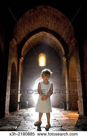 little girl inside the Romanesque church of Brancion, Saone et Loire department, Burgundy region, France, Europe. View Large Photo Image Stock Photography - little girl inside the Romanesque church of Brancion, Saone et Loire department, Burgundy region, France, Europe.. Fotosearch