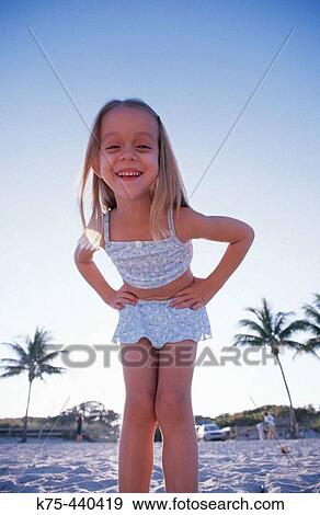 Little girl laughing at camera View Large Photo Image Stock Photo - Little girl laughing at camera. Fotosearch