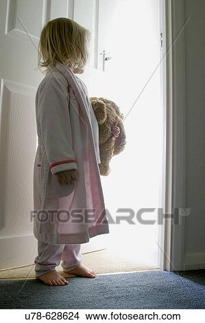 Little girl looking at magical experience View Large Photo Image Picture - Little girl looking at magical experience. Fotosearch