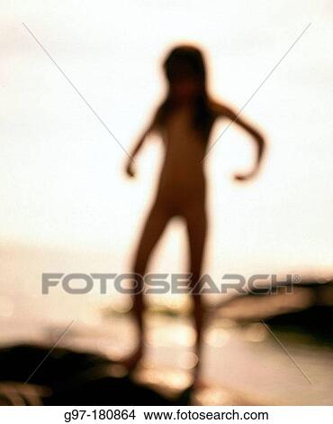 Little girl on the beach View Large Photo Image Picture - Little girl on the beach. Fotosearch