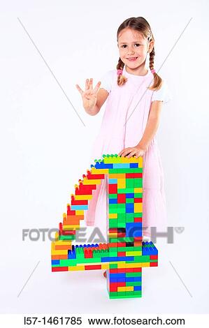 Little girl playing with Lego, Switzerland View Large Photo Image Stock Photography - Little girl playing with Lego, Switzerland. Fotosearch