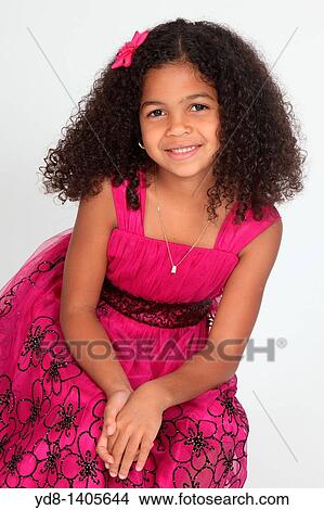 Little Girl posing smailing looking at the camera View Large Photo Image Picture - Little Girl posing smailing looking at the camera. Fotosearch