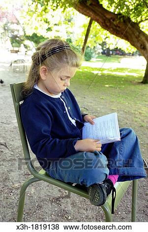 little girl reading in the Jardin du Luxembourg, Paris, Ile-de-France region, France, Europe View Large Photo Image Stock Photo - little girl reading in the Jardin du Luxembourg, Paris, Ile-de-France region, France, Europe. Fotosearch