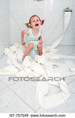 Little girl sitting on Potty in bathroom, crying and beeing frustrated while doing potty training View Large Photo Image Stock Photo - Little girl sitting on Potty in bathroom, crying and beeing frustrated while doing potty training. Fotosearch