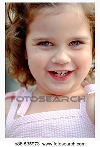 Little girl smiling View Large Photo Image Stock Image - Little girl smiling. Fotosearch