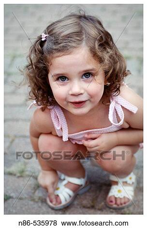 Little girl smiling View Large Photo Image Stock Photo - Little girl smiling. Fotosearch
