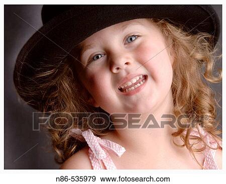 Stock Photo - Little girl smiling. Fotosearch