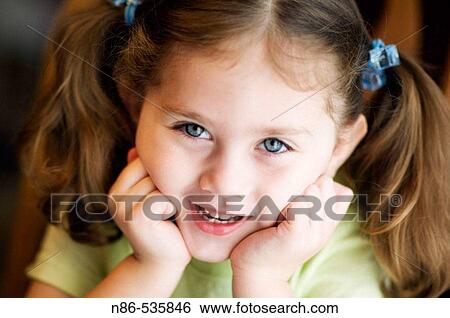 Little girl smiling View Large Photo Image Stock Photograph - Little girl smiling. Fotosearch