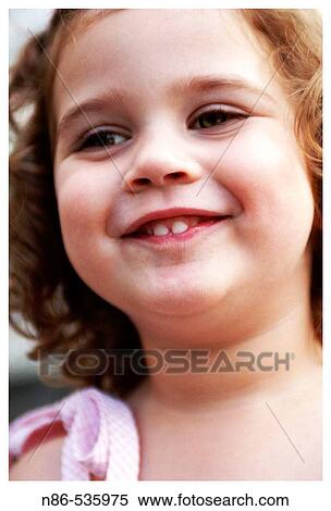 Little girl smiling View Large Photo Image Stock Photography - Little girl smiling. Fotosearch