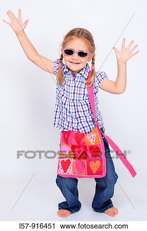 little girl standing with handbag over shoulder wearing sunglases, Switzerland View Large Photo Image Stock Image - little girl standing with handbag over shoulder wearing sunglases, Switzerland. Fotosearch