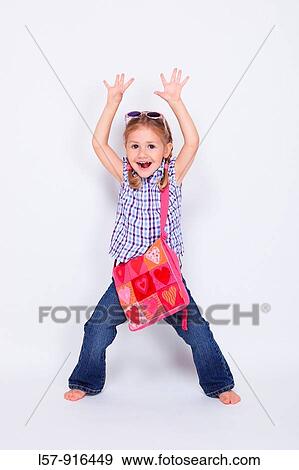 little girl standing with handbag over shoulder wearing sunglases, Switzerland View Large Photo Image Stock Photo - little girl standing with handbag over shoulder wearing sunglases, Switzerland. Fotosearch