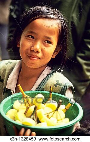 little girl vendor of pineapple kebabs, Sumatra island, Republic of Indonesia, Southeast Asia and Oceania View Large Photo Image Stock Photo - little girl vendor of pineapple kebabs, Sumatra island, Republic of Indonesia, Southeast Asia and Oceania. Fotosearch
