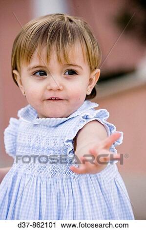 Little girl walking her first steps View Large Photo Image Stock Image - Little girl walking her first steps. Fotosearch
