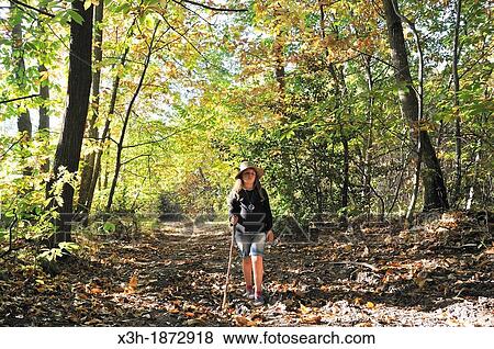little girl walking on a path in the Forest of Rambouillet, Yvelines department, Ile-de-France region, France, Europe View Large Photo Image Stock Photo - little girl walking on a path in the Forest of Rambouillet, Yvelines department, Ile-de-France region, France, Europe. Fotosearch