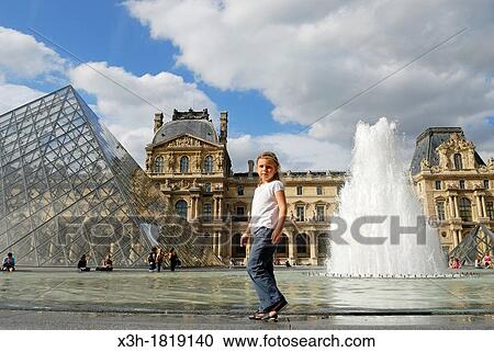 little girl walking on the edge of the pond surrounding the Louvre Pyramid in the main courtyard Napoleon of the Louvre Palace, Paris, Ile-de-France region, France, Europe View Large Photo Image Stock Image - little girl walking on the edge of the pond surrounding the Louvre Pyramid in the main courtyard Napoleon of the Louvre Palace, Paris, Ile-de-France region, France, Europe. Fotosearch