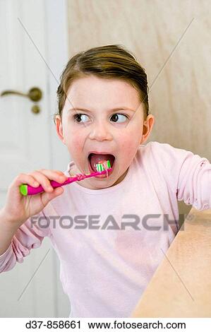 Little girl washing her teeth View Large Photo Image Stock Image - Little girl washing her teeth. Fotosearch