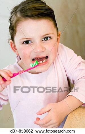 Little girl washing her teeth View Large Photo Image Stock Image - Little girl washing her teeth. Fotosearch