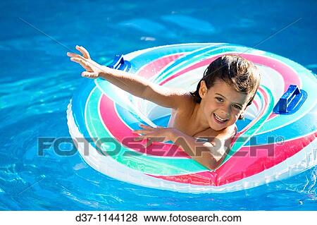 little girl waving happy in a swimming pool View Large Photo Image Stock Photo - little girl waving happy in a swimming pool. Fotosearch