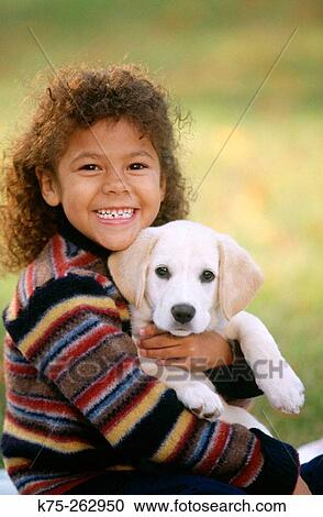 Little girl with a puppy View Large Photo Image Stock Image - Little girl with a puppy. Fotosearch
