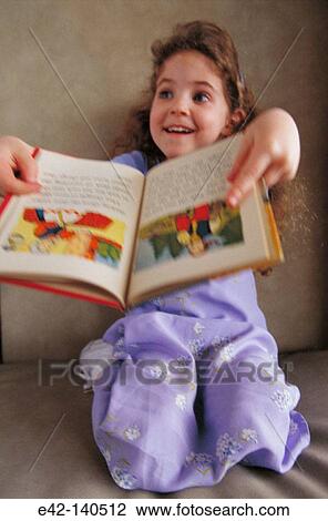 Little girl with book View Large Photo Image Stock Image - Little girl with book. Fotosearch