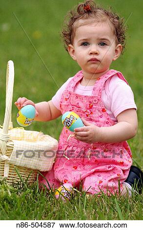 Little girl with Easter basket View Large Photo Image Stock Photo - Little girl with Easter basket. Fotosearch