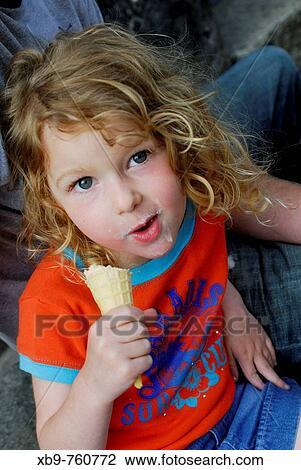 Little girl with ice cream View Large Photo Image Stock Image - Little girl with ice cream. Fotosearch
