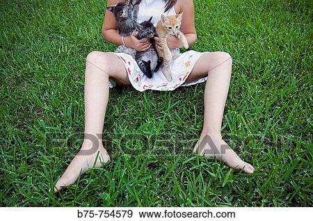 Little girl with kittens View Large Photo Image Stock Photo - Little girl with kittens. Fotosearch