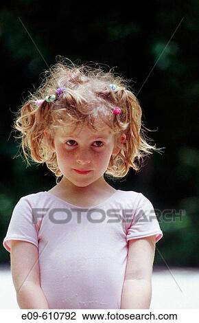 little girl with many short pigtails, in pink leotard View Large Photo Image Stock Image - little girl with many short pigtails, in pink leotard. Fotosearch