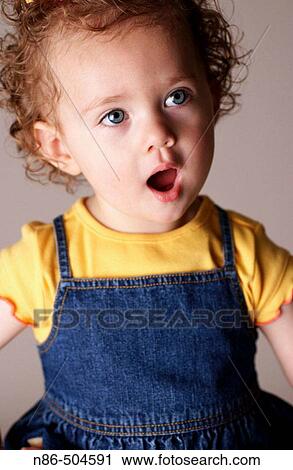 Little girl with surprised expression View Large Photo Image Stock Image - Little girl with surprised expression. Fotosearch