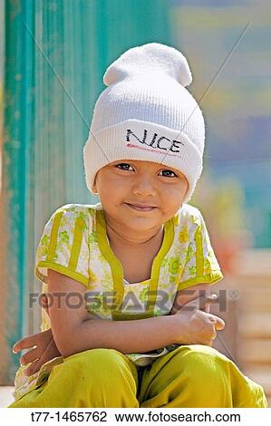 Little girl with with woollen cap View Large Photo Image Stock Image - Little girl with with woollen cap. Fotosearch