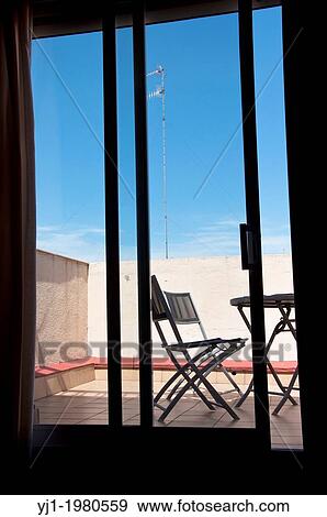 Little terrace, backlighting, Garraf, Barcelona, Catalonia, Spain. View Large Photo Image Stock Photo - Little terrace, backlighting, Garraf, Barcelona, Catalonia, Spain.. Fotosearch