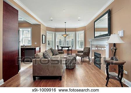 Living room in condominium with marble fireplace View Large Photo Image Stock Photograph - Living room in condominium with marble fireplace. Fotosearch