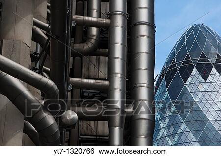 Lloyds of London and the Gherkin buildings in London's financial district England View Large Photo Image Stock Photograph - Lloyds of London and the Gherkin buildings in London's financial district England. Fotosearch