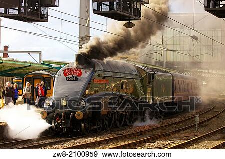 Stock Photo - LNER Class A4 60009 Union of South Africa at Carlisle Railway Station Carlisle Cumbria England United Kingdom Great Britain.. Fotosearch