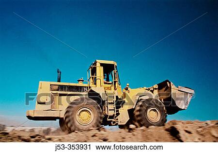 Loader in motion. I-880 Cypress project. Oakland, California. USA. View Large Photo Image Stock Image - Loader in motion. I-880 Cypress project. Oakland, California. USA.. Fotosearch