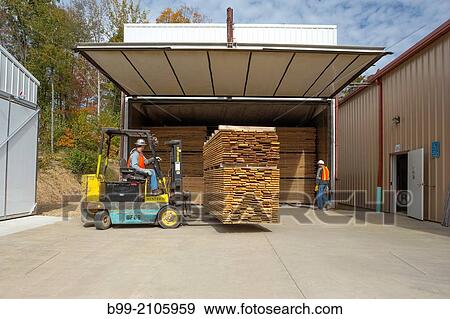 LOADING DRYING KILN WINDRIVER WOODWORKS LUMBER YARD JEFFERSON COUNTY PENNSYLVANIA USA. View Large Photo Image Stock Photo - LOADING DRYING KILN WINDRIVER WOODWORKS LUMBER YARD JEFFERSON COUNTY PENNSYLVANIA USA.. Fotosearch